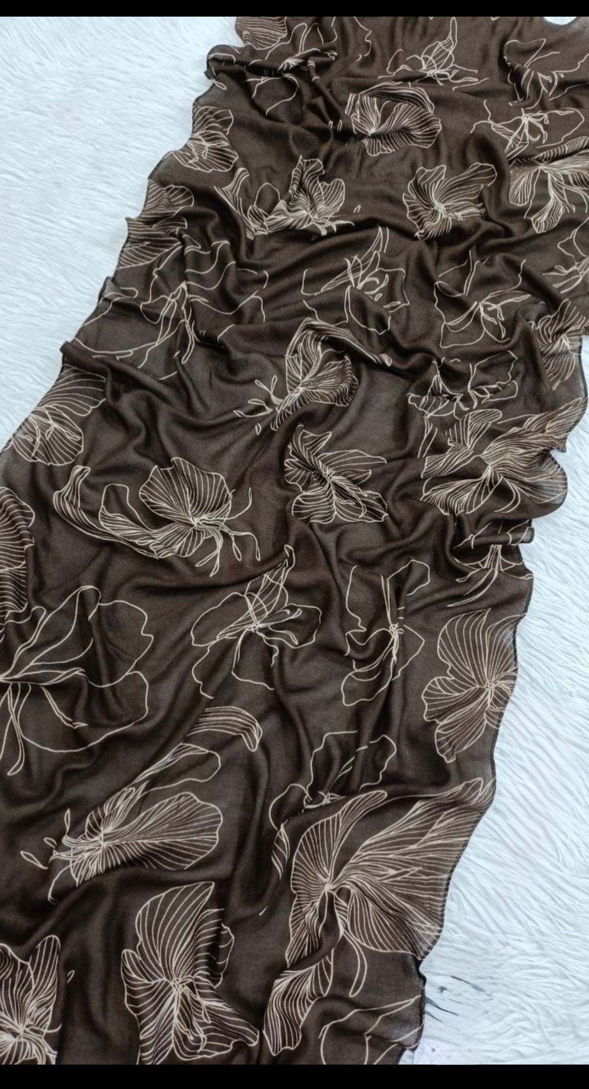 : A tossed botanical print, model hijab