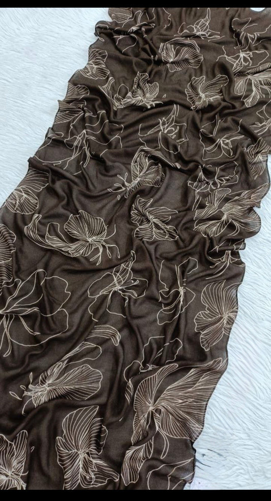 : A tossed botanical print, model hijab
